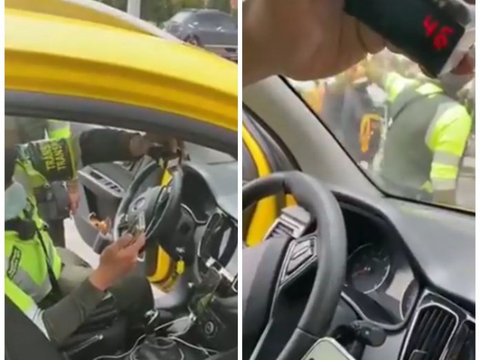 Policía 'pilló' a taxistas adulterando con aplicaciones móviles los taxímetros en Bogotá